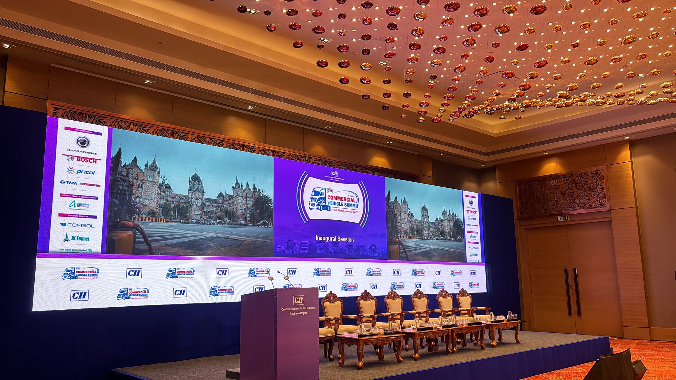 CII industry panel discussion on a large LED-backed stage in front of a full audience